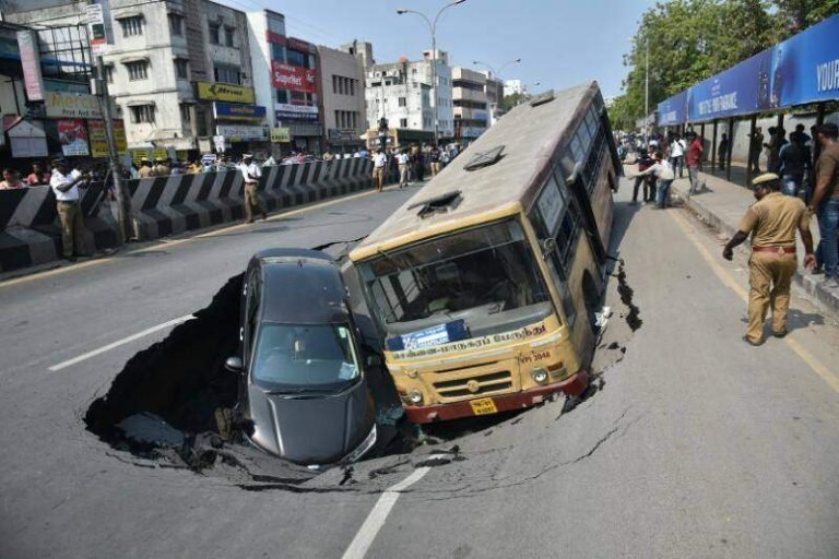 Chennai Metro | Chennai’s arterial Anna Salai caves in trapping bus and car