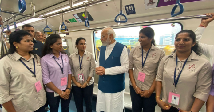 Hon'ble PM, Narendra Modi, interacting with people from various walks of life during his ride on the Newly inaugurated Metro.