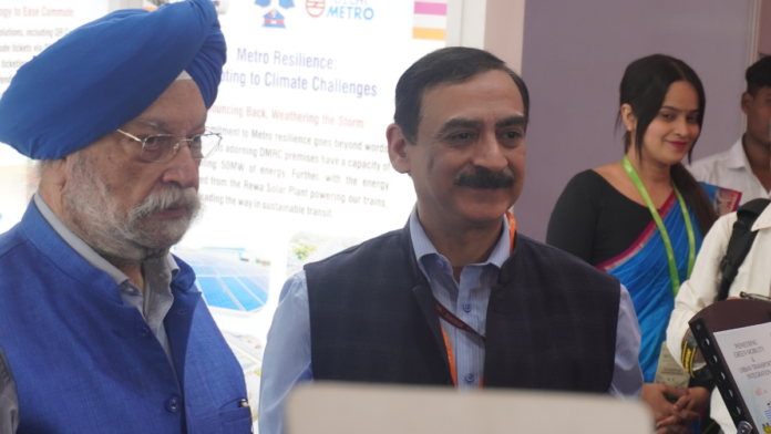 DMRC chief Vikas Singh (on the right)