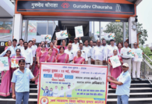 Kanpur Metro’s Voter Awareness Journey Educates and Inspires Commuters Educators with banner at Gurudev Chauraha Metro to Educate First-Time Voters