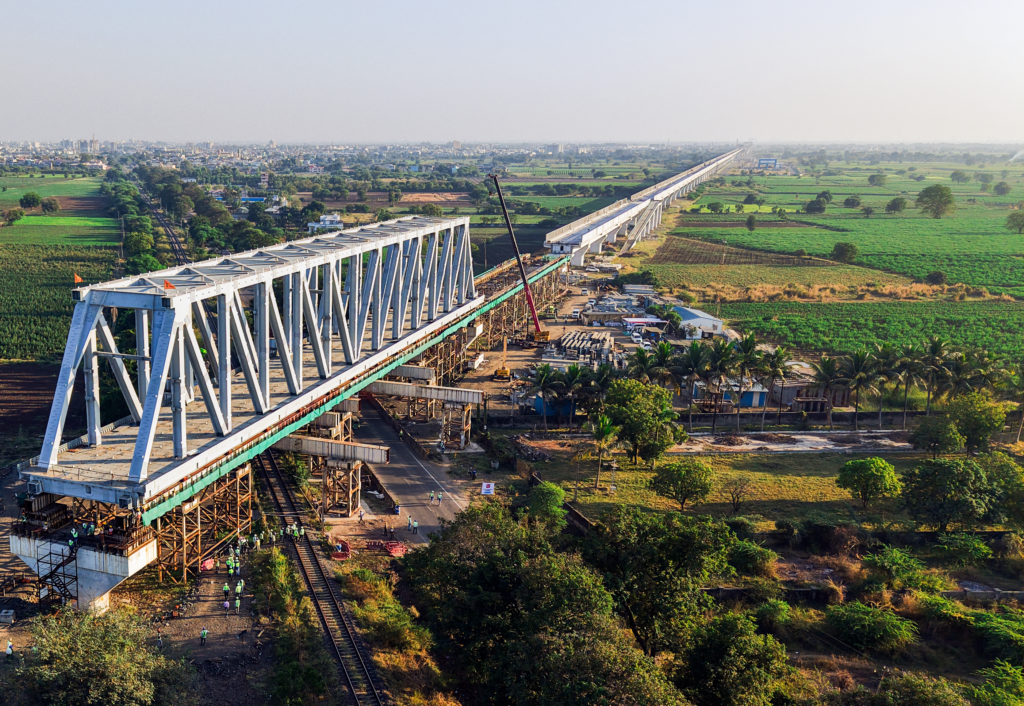 130m Span Launched over National Highway-64 in Gujarat for Bullet Train Project 1 130 m span of a 230 m long steel bridge launched over NH 64 Indian Railway tracks for Bullet Train Project 01 0